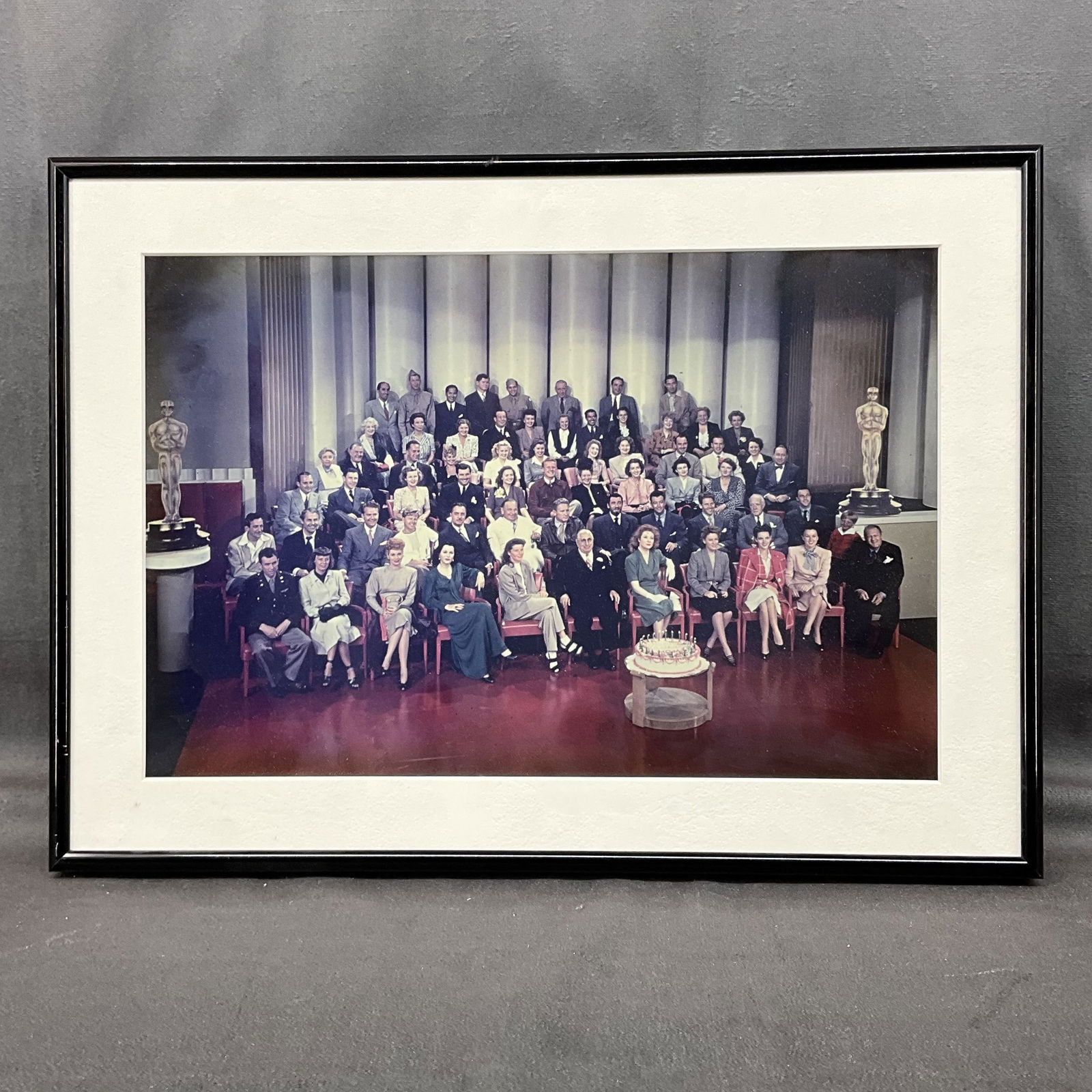 Photograph, 1943 MGM Studio Cast, 20th Anniversary: Photograph, 1943 MGM Studio Cast, 20th Anniversary. Among sitters, Lucille Ball, Louis B. Mayer, James Stewart, Hedy Lamar, Spencer Tracy, Gene Kelly, Katherine Hepburn, Donna Reed, and more. Size: 12