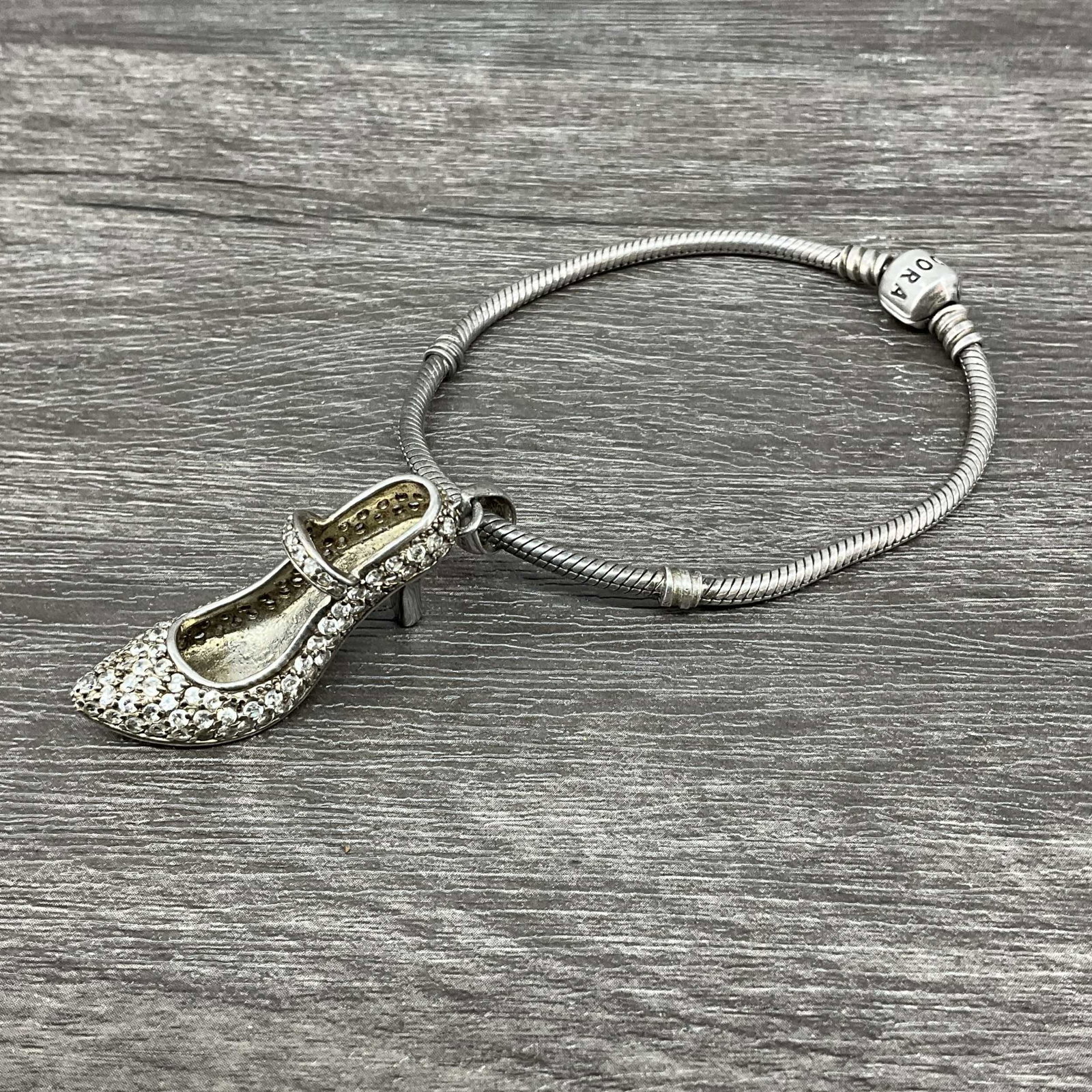 Sterling Silver Pandora Bracelet, CZ Pave Stiletto: Sterling Silver Pandora Bracelet, CZ Pave Stiletto (not Pandora) charm stamped 925. Size: 8"L
