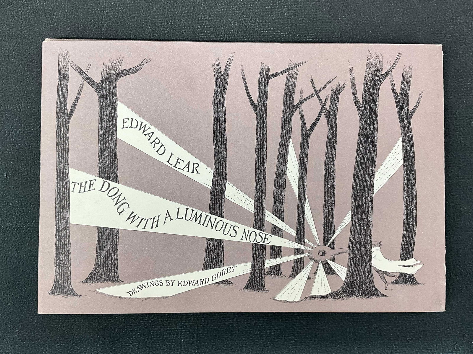 Edward Lear, The Dong With A Luminous Nose, Gorey: The Dong With a Luminous Nose by Edward Lear and illustrations from Edward Gorey. Wear to edges. Size: 6.25"T x 9.25"L