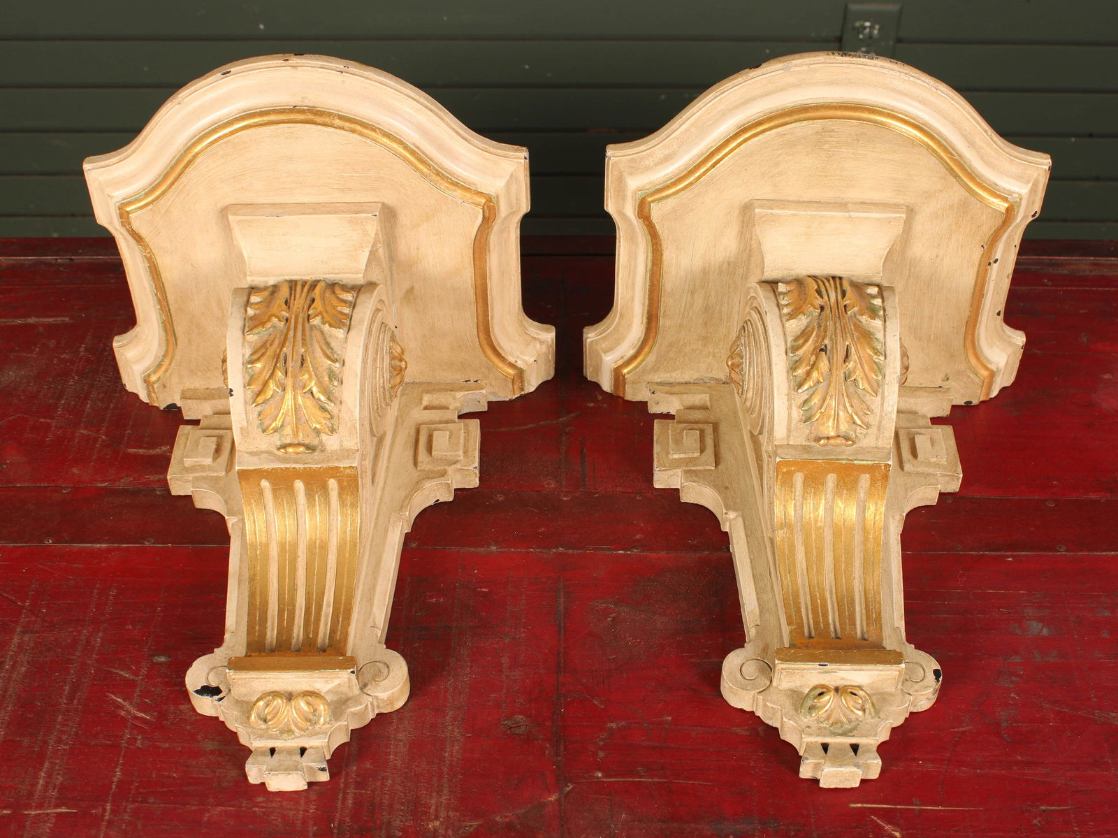 Pair French Provincial Brackets: Pair of cream and gold painted French style brackets. Size: 14"T x 11.75"L x 10"D