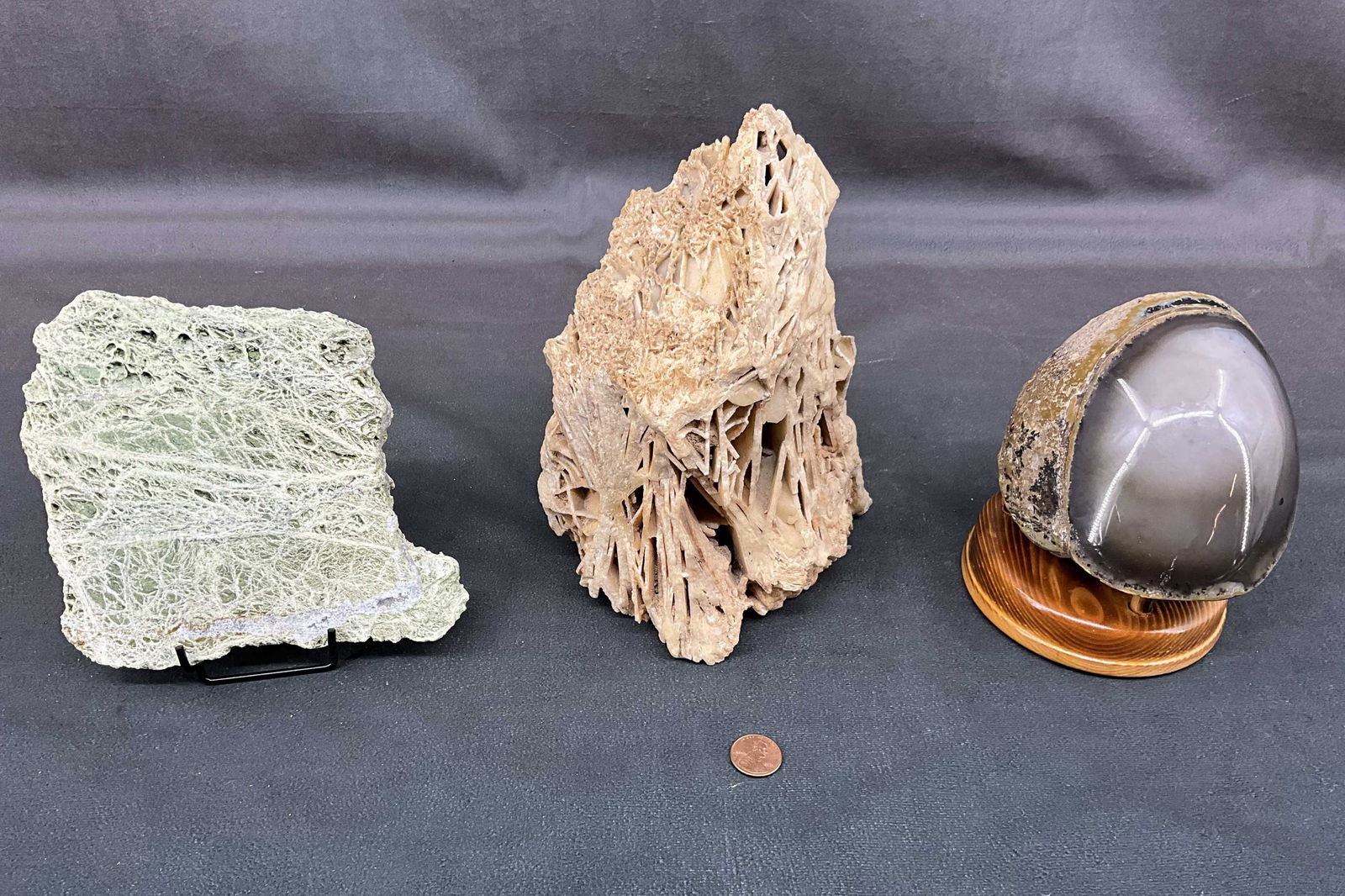 Tufra Volcanic Rock, Quartz & Evil Eye Agate: Tufra volcanic rock, angled plated quartz, and agate with a polished eye. Stands included. Size: largest 8"T x 6"W x 4.5"D Provenance: From the lifetime collection of an Oreland, Pennsylvania private