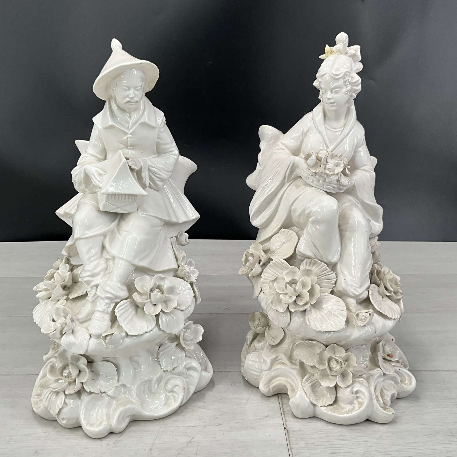 Pair Asian Blanc de Chien Figures: Pair Asian Blanc de Chien Figures, stamp illegible, possibly labeled Italy (?). Size: 14"T x 7"W x 7"D each