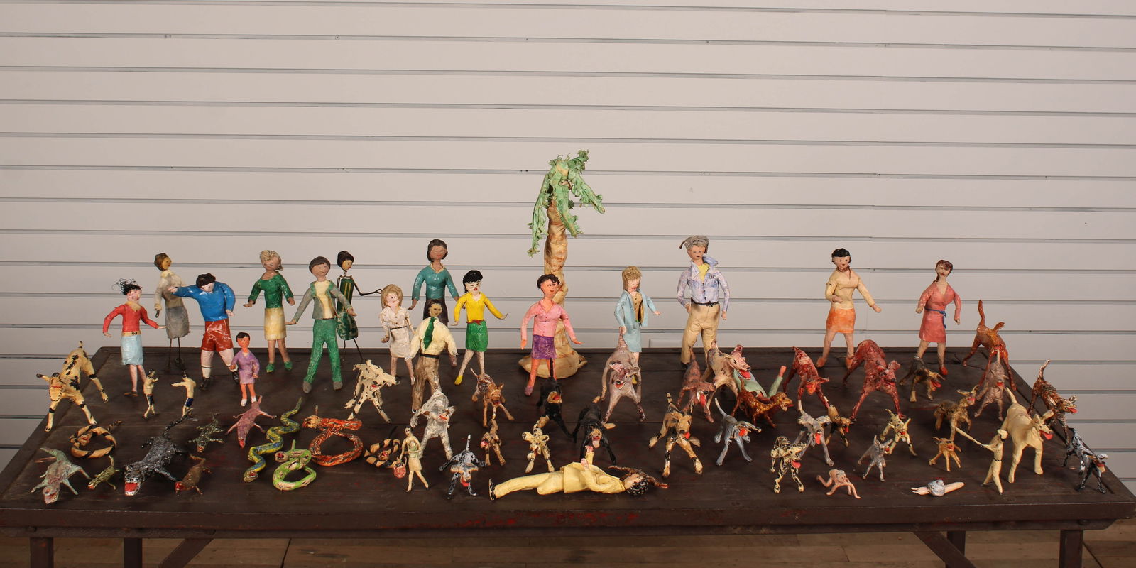 Folk Art Collection of Masking Tape Sculptures: Folk Art Collection of Masking Tape Sculptures, people and animals, various poses. Size: various 15"T-3"T