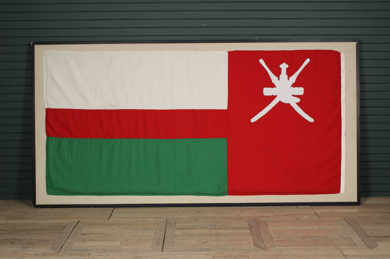 Enormous Framed Flag of Oman: Enormous Flag of Oman. Linen. mounted on a frame. Size: 61" x 120" frame, 53" x 112" flag.