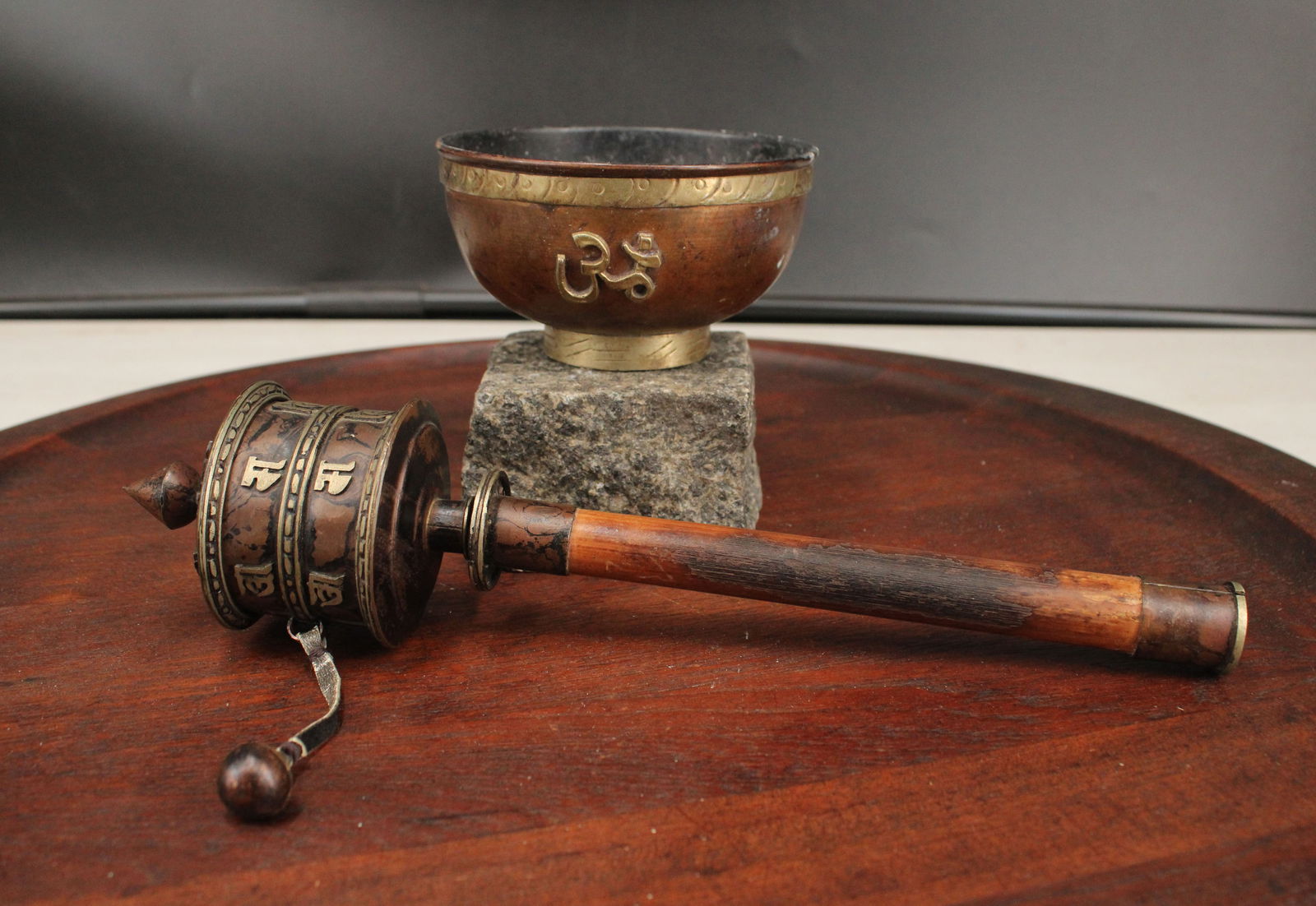 Tibetan Ritual Prayer Wheel and Ceremonial Bowl: Tibetan Ritual Prayer Wheel and Ceremonial Bowl. Size: prayer wheel 10.5" bowl 2.5"H x 4"dia.