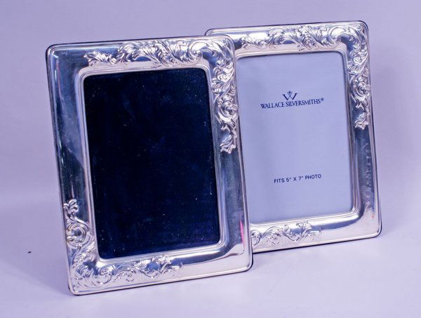 2 Wallace Sterling Silver and Black Velvet Picture Fram: A matched pair of Wallace Silversmiths sterling silver and black velvet picture frames, each 5 1/2" x 8" (fitting 5" x 7" photos, 925 sterling marks.
