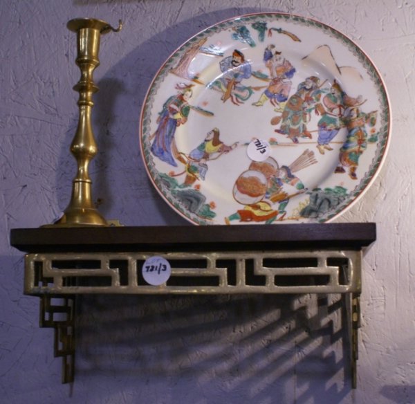 Chinese Brass & Mahogany Plate Shelf, Chinese Porcelain: A Chinese brass and mahogany 12 1/2"w x 6 1/2"d x 6"w wall mount plate shelf, together with an 8 3/4"h brass candlestick, topped off with a 10 1/4" Chinese porcelain plate depicting scenes of ancient 