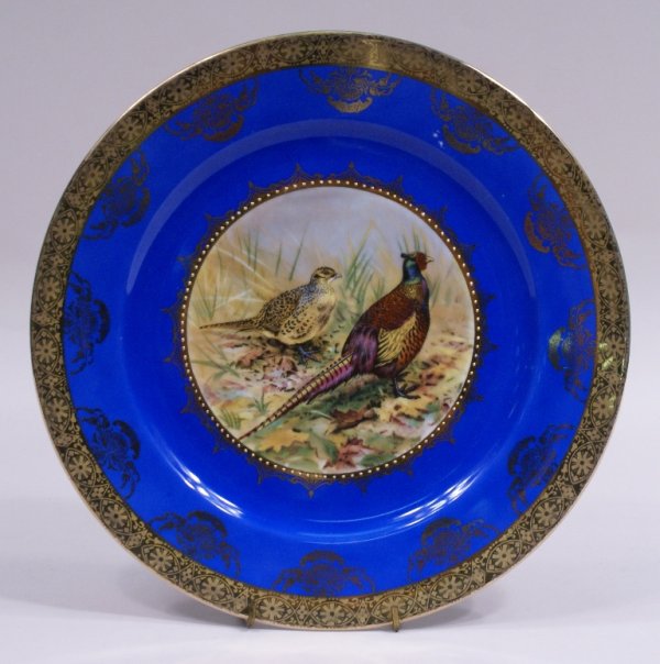 Bavaria Game Birds Hand Painted Cabinet Plate: A Royal Vienna style 10 1/2" Bavarian "Game Birds" cabinet plate, hand painted on a Hutchenreuther porcelain blank with an elaborately gilded border, marked in overglaze blue with a Royal Vienna pseud