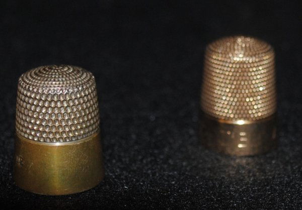 Antique Simons Thimbles: 14k and Sterling: A pair of size 12 Simons thimbles, one sterling and the other unmarked gold and engraved BBT-DBT 1-21-21