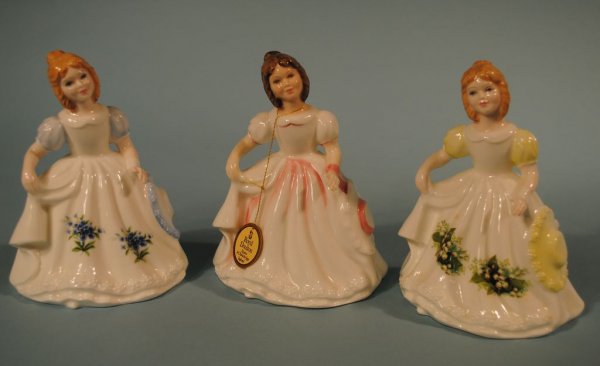 3 Royal Doulton Ladies: "Amanda", "May" and "July": A group of three Royal Doulton Lady figures: c1985 HN 3406 "Amanda", c1991 HN 3334 "May", and c1990 HN 3324 "July"