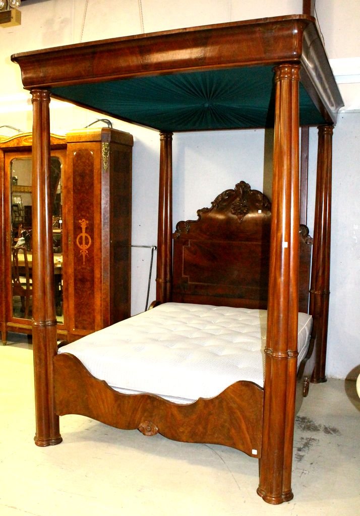 19th Century Mahogany Tester Bed: 19th century mahogany cluster post, full tester bed. Mahogany plantation bed with foliage scrolled, flower carved headboard, cluster shaped posts with ogee crown molding, custom mattress; 55" w., 73 1