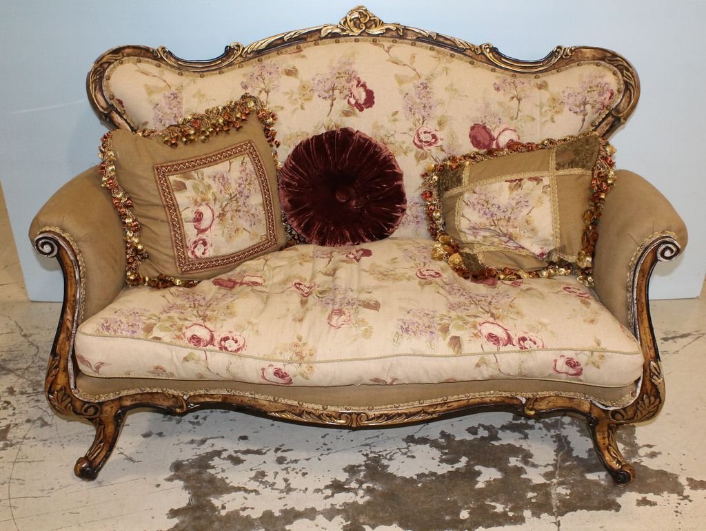 Country French Style Settee: Country French style settee covered in a floral cotton, cushion seat and matching throw pillows; 58" w., 26" d., 41" h.