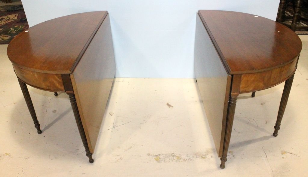 Demi-Lune Dining Table: Two part demi-lune Sheraton style dining table. Legs swing out to support drop leaves. Two sections are great for consoles. Consoles; 48" w., 24" h. ; leaves, 24"
