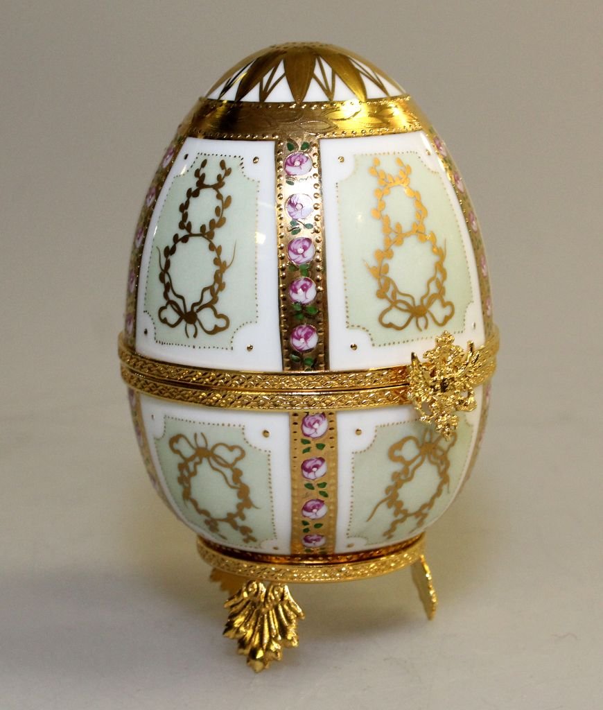 Limoge France Gold Enamel and Jewel Faberge Egg: Limoge France gold enamel and jewel Faberge egg "Love Doves", #480, with original box.; 6" h.