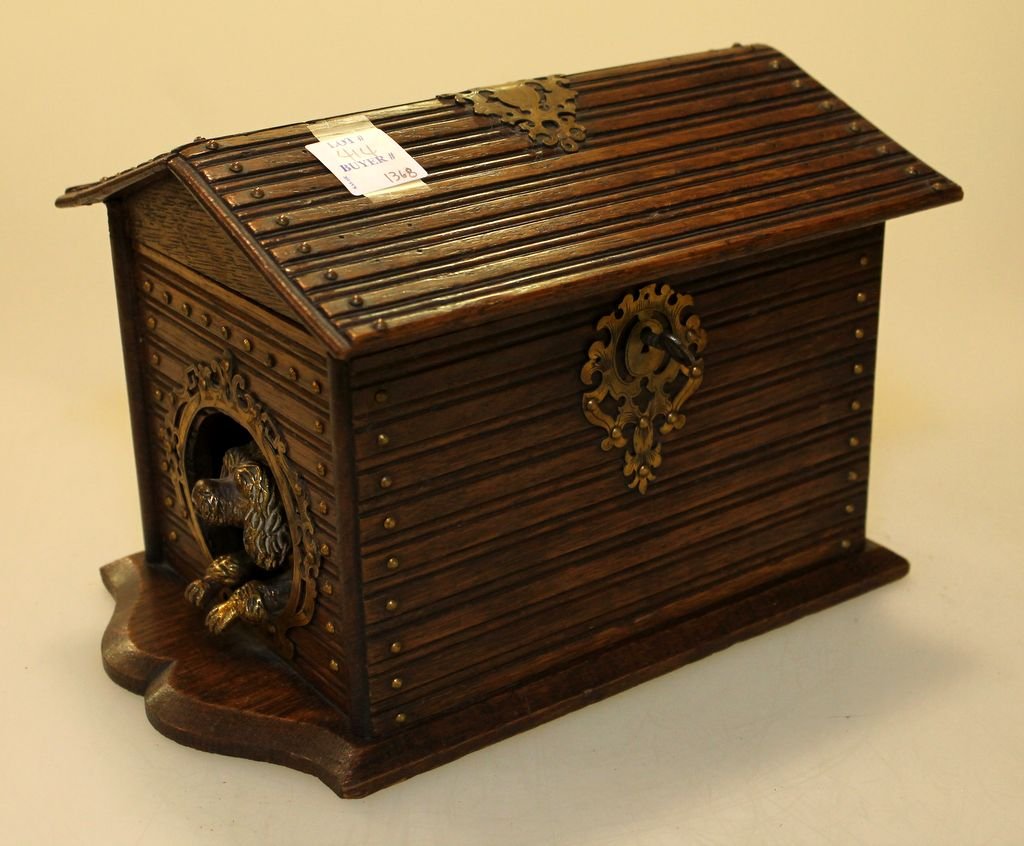 Antique Cigar Black Forest Box of Brass Dog Escaping: Antique cigar Black Forest box of brass dog escaping doghouse.; 6 1/2" w., 9" d., 5 1/2" h.