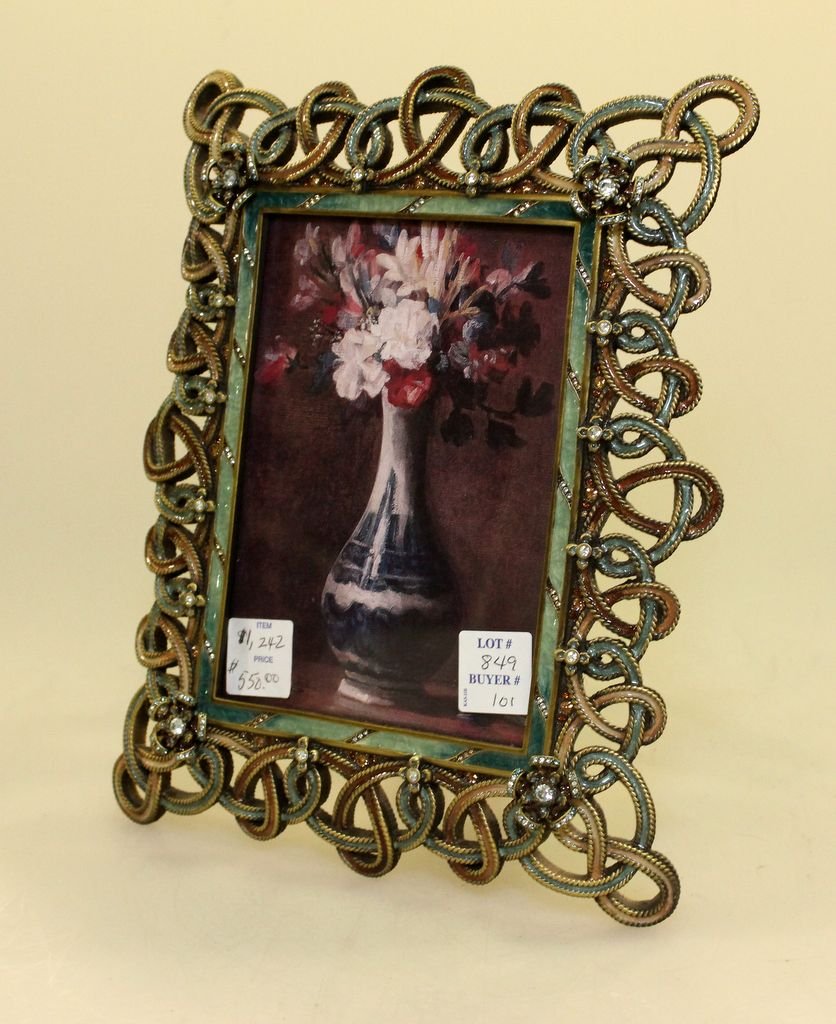 Jay Strongwater Frame: Jay Strongwater frame with delicate design enamel and stone frame.; 8 1/2" w., 10" h.