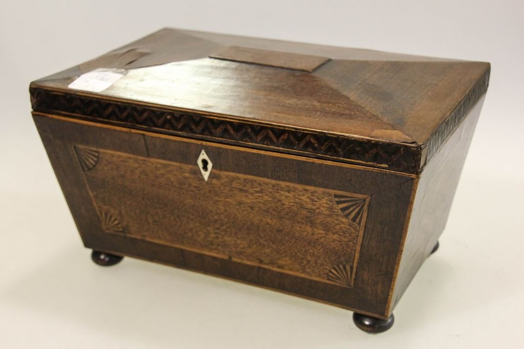 19th Century Mahogany Tea Caddy: 19th century mahogany footed tea caddy with inlay fans, ivory escutcheon, bone interior pulls.; 10" w., 6 1/2" d., 5 1/2" h.