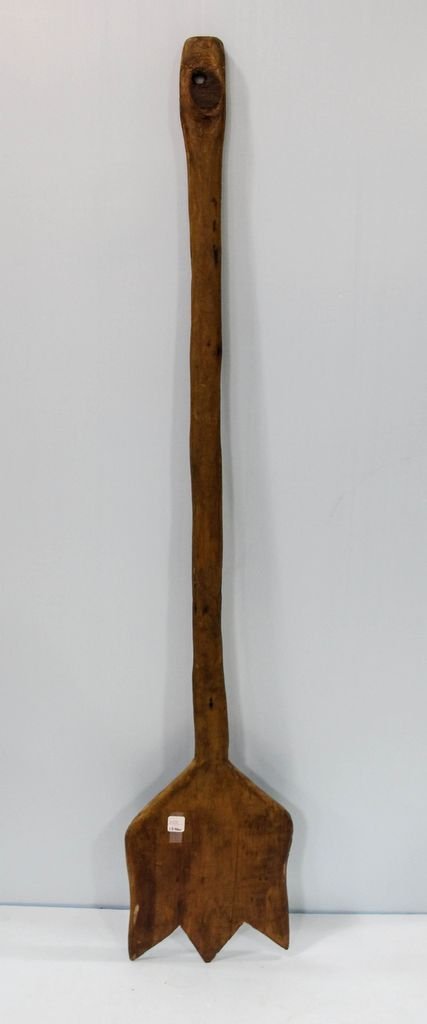Antique Wood Utensil: Antique wood utensil used to put in and take out items in the fireplace.; 10" w., 54" h.