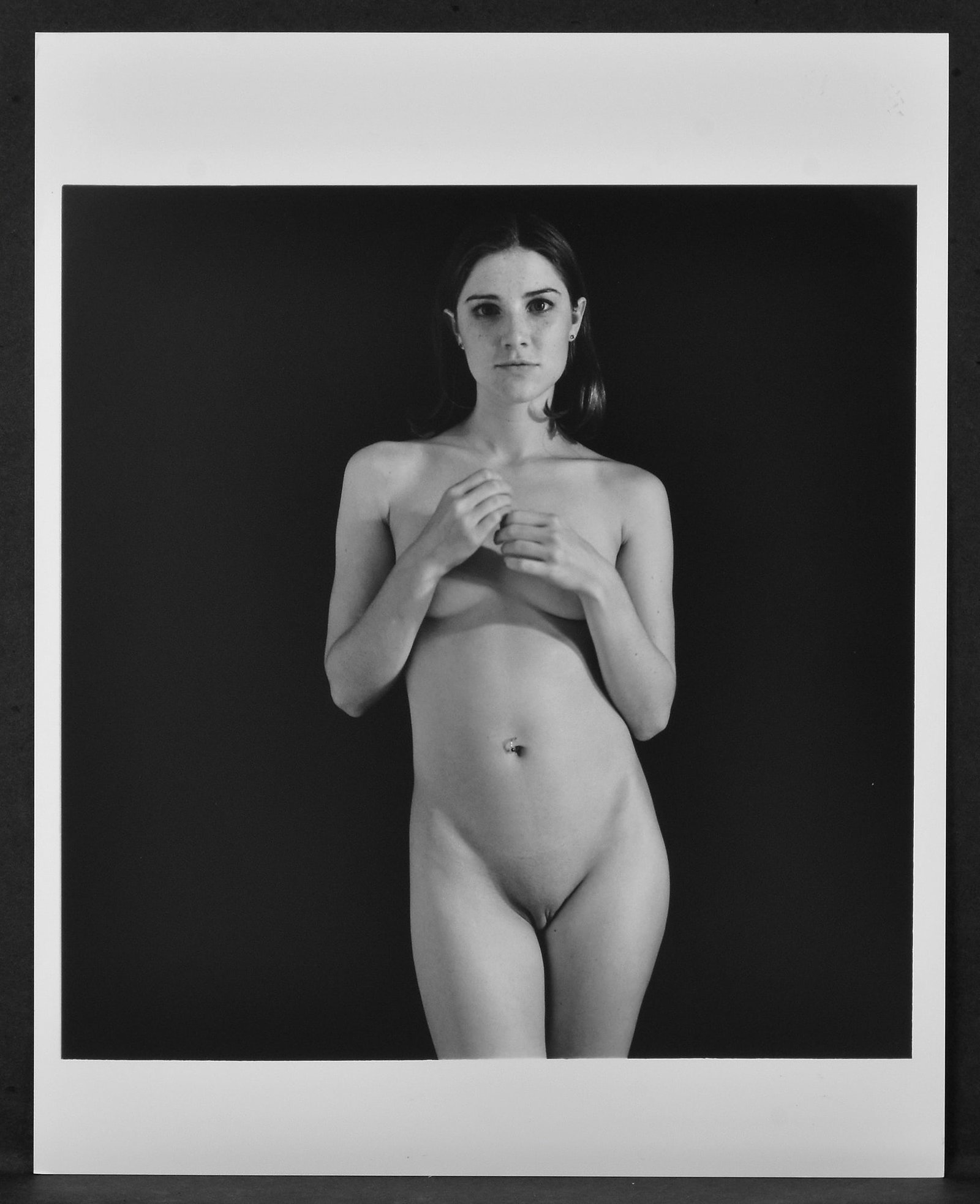 Ethan Long 4 Signed 2003 Michelle K. in Studio 8"x7.5" Photographs: Four gelatin silver RC photographs High quality printing on 8"x10" paper, images are smaller than paper size Hand-signed by artist on the back as shown The following are a few words about Long in his