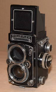 Rolleiflex 2.8E Type2 Serial # 1655882 Carl Zeiss Planer 80mm 2.8 with Case, Cap, & Strap: From the Internet....this Rolleiflex 2.8E with serial number 1,655,882 was manufactured between 1956 and 1959, placing it within the serial number range of 1,621,000 to 1,665,999 for the 2.8E model