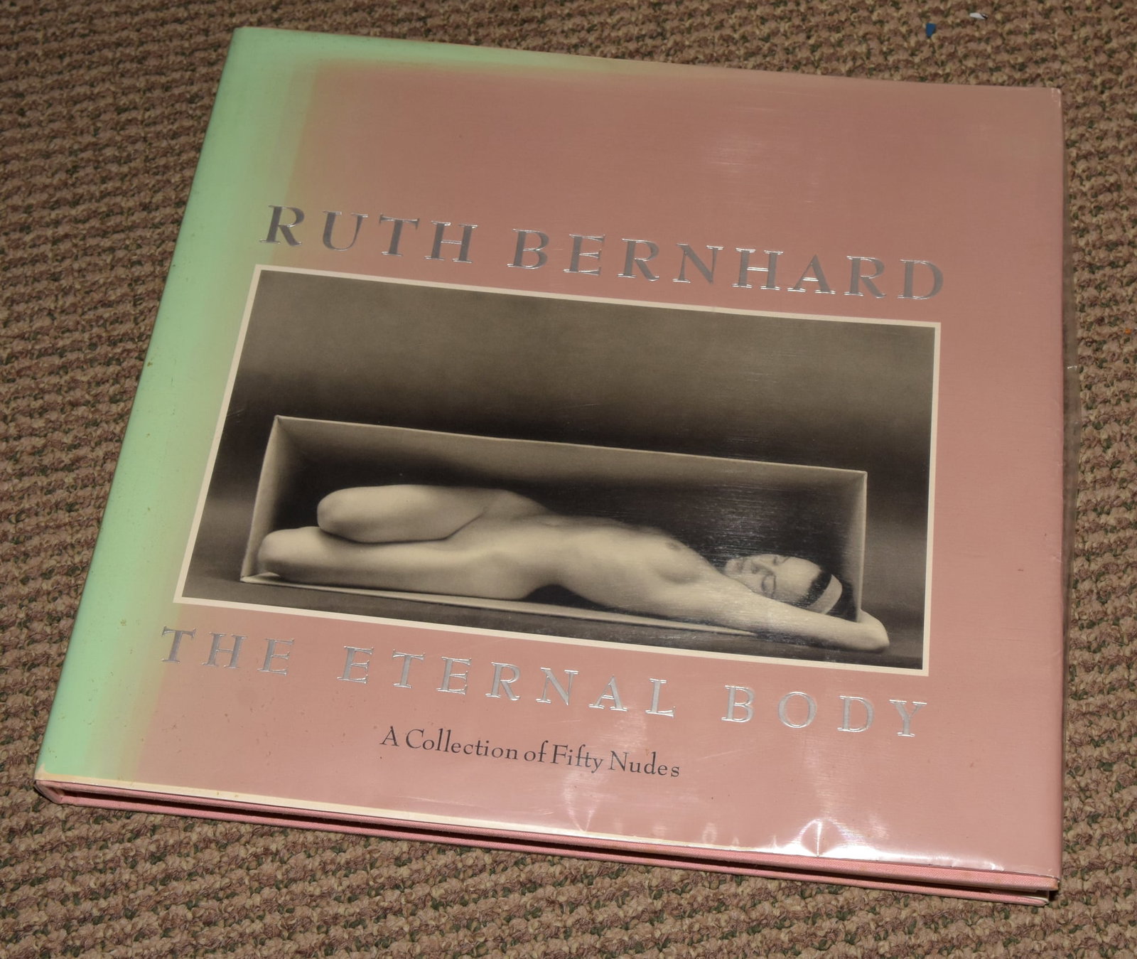 Ruth Bernhard (1905 - 2006) Signed 1986 The Eternal Body Hardcover - Photography West Graphics: Signed Hardcover The Eternal Body, A Collection of Fifty Nudes, Photographs by Ruth Bernhard. With the dust jacket. 24 pages essay entitled "The Nude: Symbol and Light" by Margaretta Mitchell. 50 blac