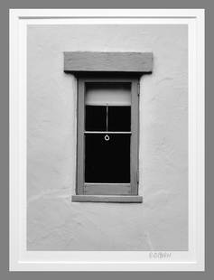 Robert Osborn (1938 - ) Signed 1990 Window, Carmel, Ca 12"x8.5" Photograph - Estate Collection: Gelatin silver photograph Darkroom made photograph mounted/matted to 16"x20" museum board Signed under the image, titled on the back Osborn was in the publishing business in Southern California in the