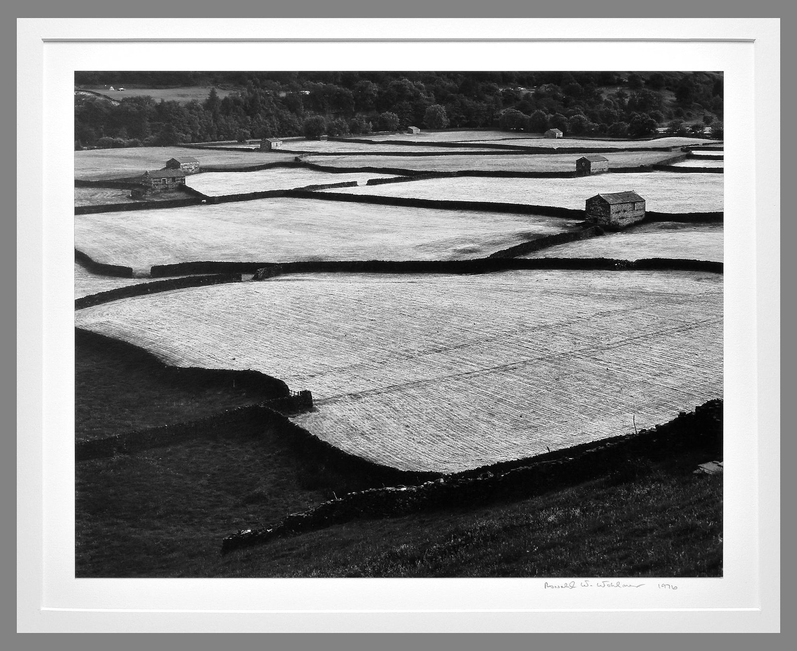 Ronald Wohlauer (1947 – 2004) Signed 1976 Stone Barns - Yorkshire Dales 10.25"x13" Photograph: From the back cover of Wolhauer's book - "Wohlauer is a young photographer with the aesthetic and technical assurance of a master. His work invites comparison to Paul Strand, Edward Weston, and Ansel