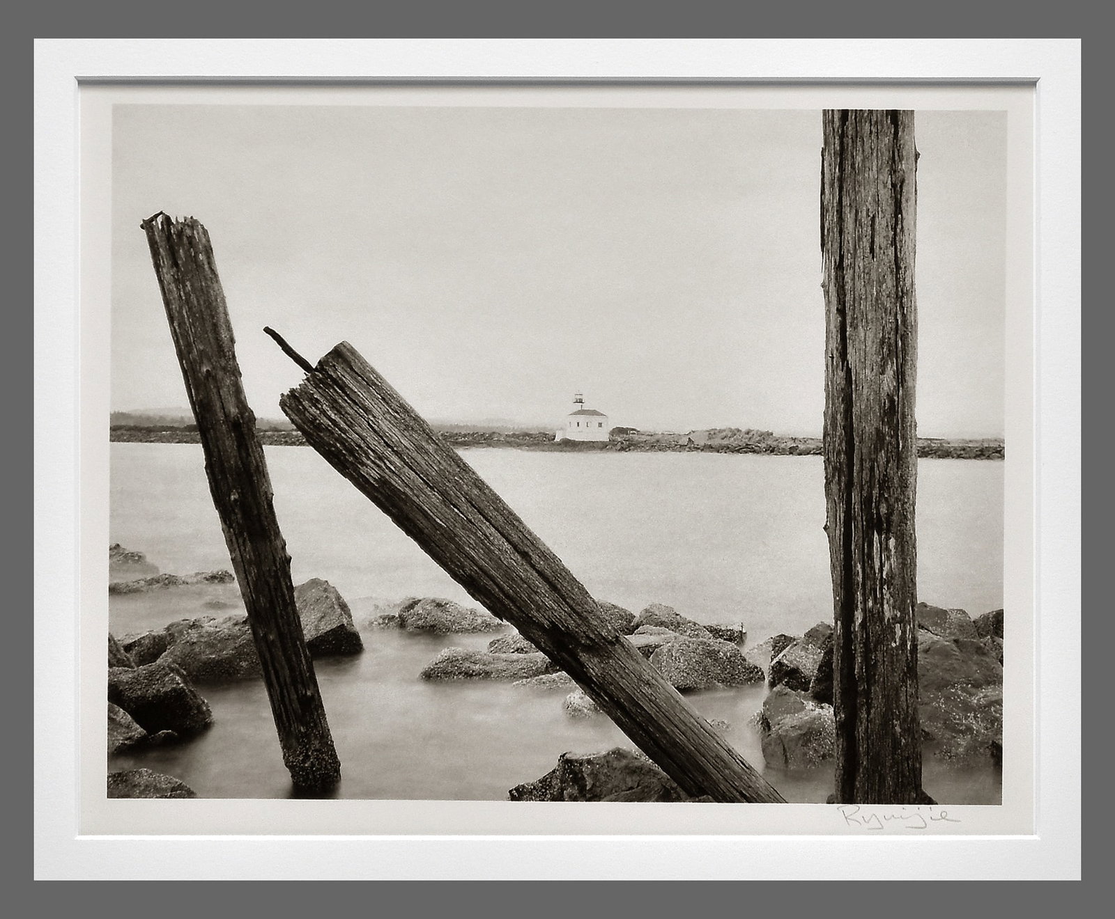Ryuijie (1950 - ) Signed 2001 Lighthouse - Oregon 8.5"x11" Oversized Platinum Photograph: Platinum photograph Signed under the image with photographer's information below the image, under the mat Corner mounted and matted with 16"x20" museum board Ryuijie (b. 1950, Otaru, Japan) moved to t