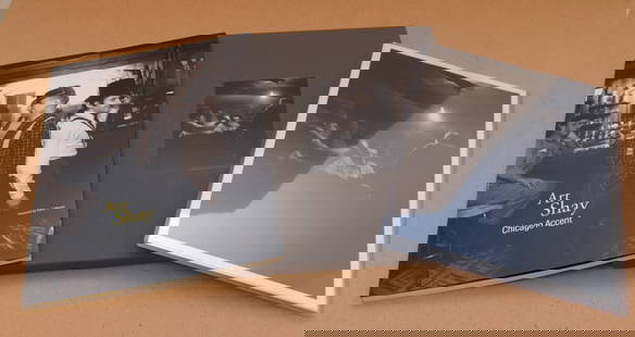 Art Shay (1922 - 2018) Signed Chicago Accent Book with Original Signed 8"x10" Photograph #4/50: Man with the Golden Arm, 1949 8"x10" signed photograph, #4/50 Signed Chicago Accent book, paperback with slipcase I wasn't able to find the book with photo set online, the signed book alone is around