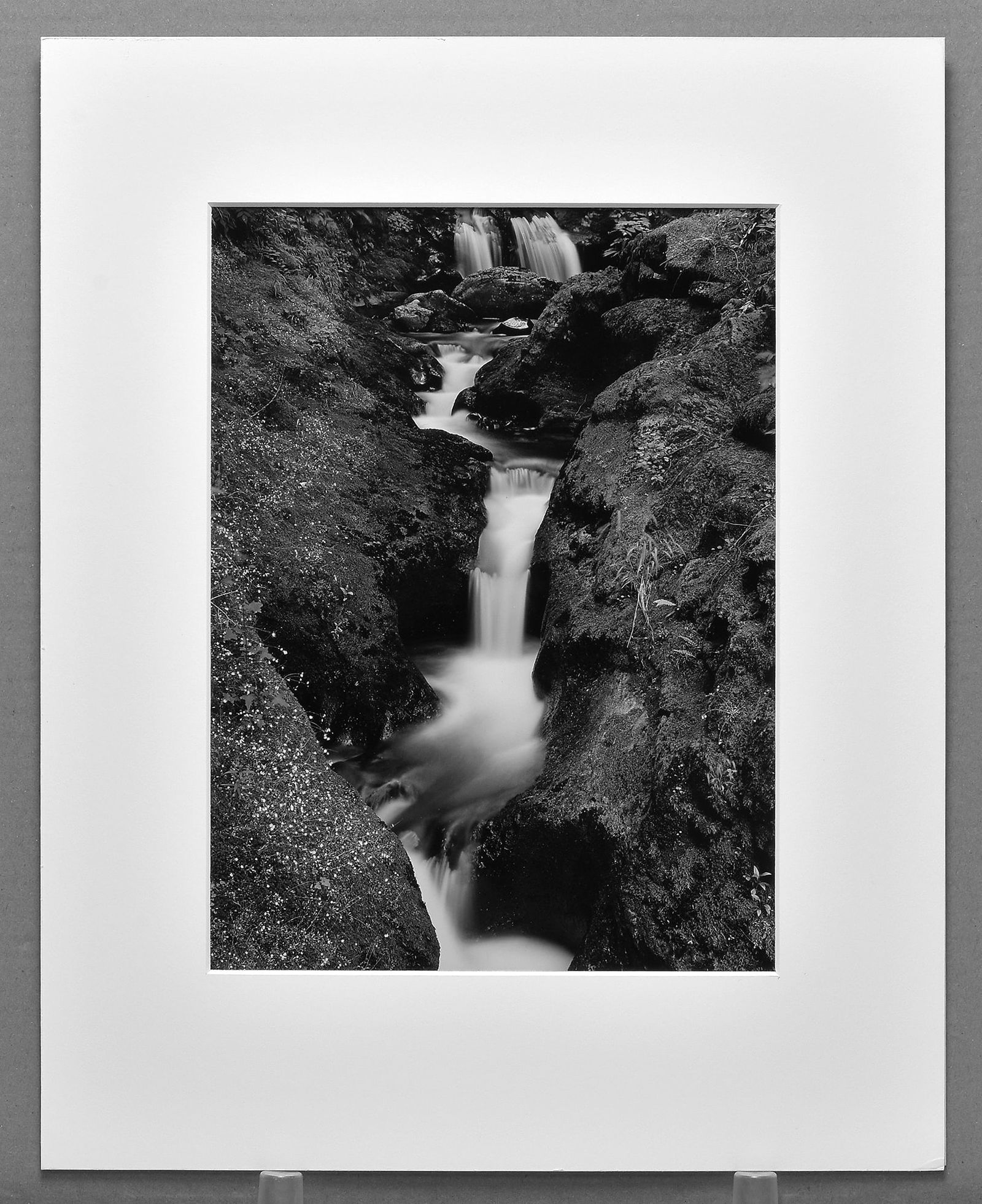 Stu Levy (1948-) Signed 1985 Duncan Creek Falls - Washington 13.5"x10" Photograph: A classic Stu Levy photograph from the 1980s! Gelatin silver photograph Matted with 16"x20" museum board Taken in 1985, printed in 1986 Signed under image, with photographer's stamp on the back Stu Le