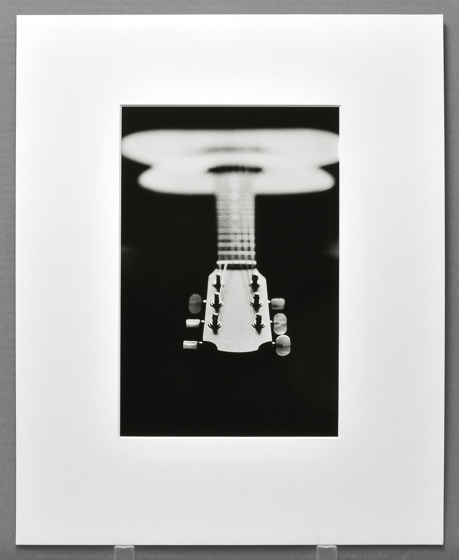 Ralph Gibson (1939-) Signed 2005 Guitar Abstract 12.5"x8.5" Photograph: An elegant study of form by Ralph Gibson, signed and printed in his distinctive style. Beginning at $100 with no reserve, this lot makes a seminal work of modern photography accessible to discerning c