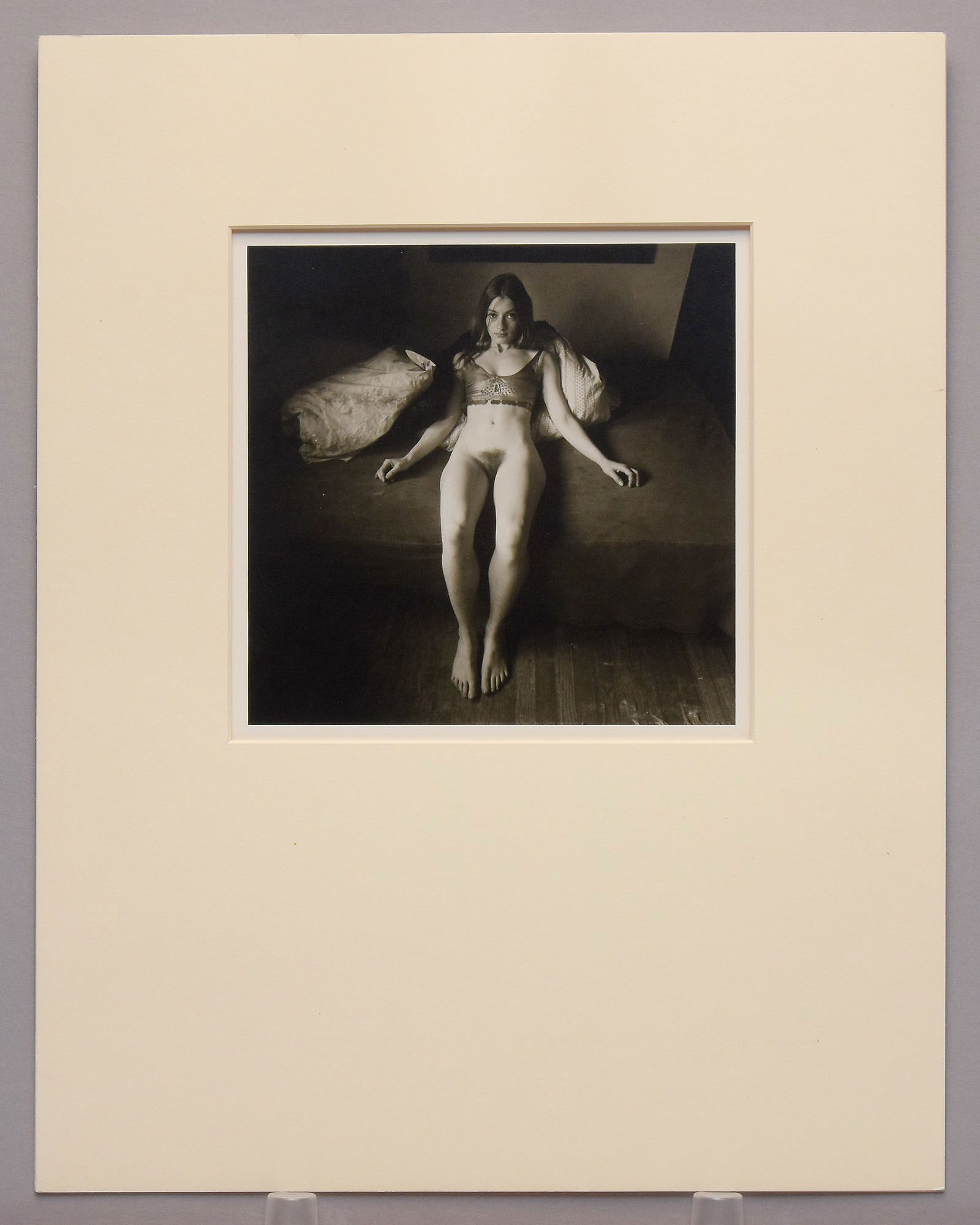 Wayne R. Lazorik (1939-2023) Signed 1973 Ivy 7.5"x7.5" Photograph - Kean Wilcox Collection: A compelling early work by Wayne R. Lazorik, Ivy (1973) reflects the artist’s signature exploration of intimate, psychologically charged interiors. The sensitively composed figure study—poised on