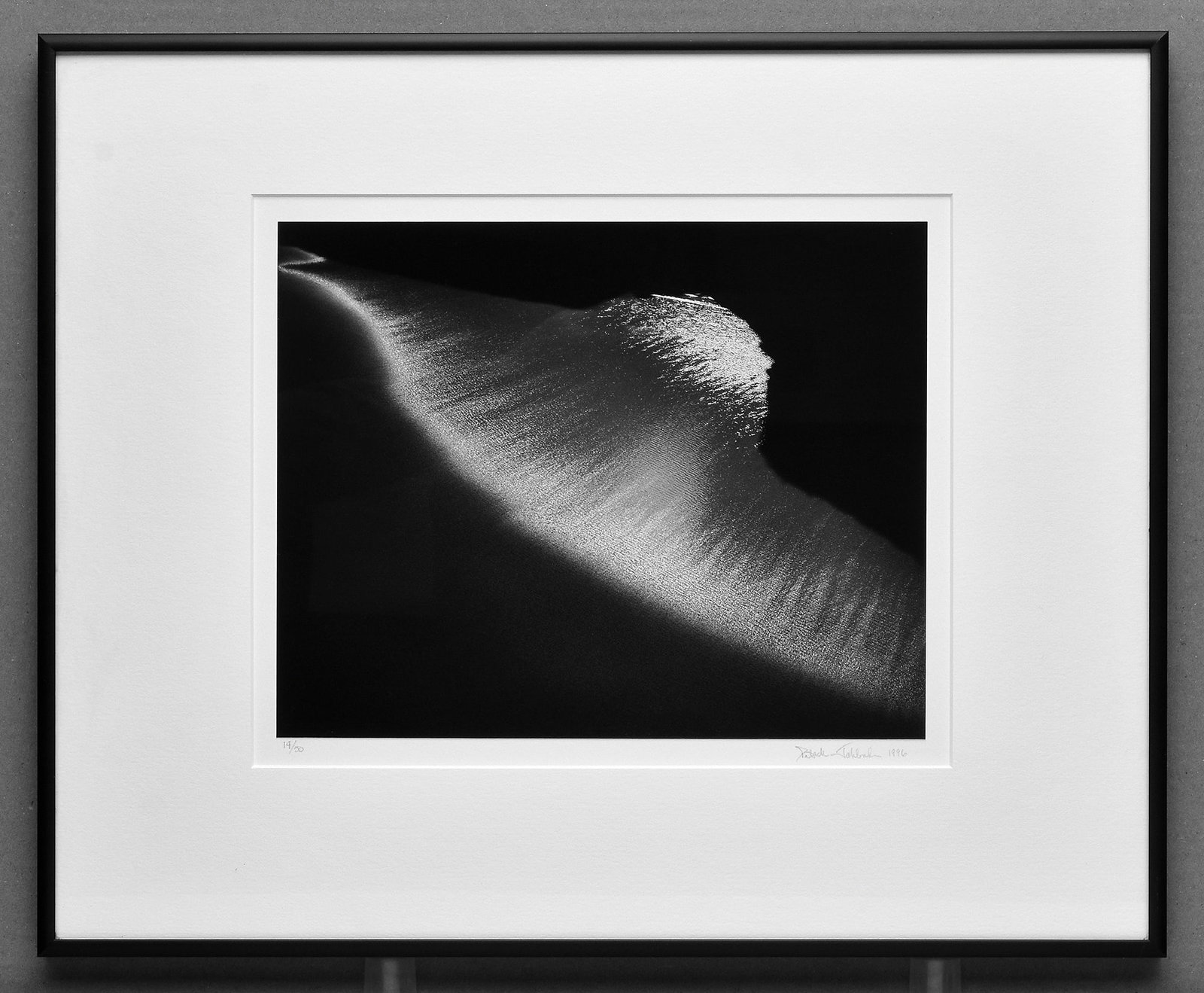 Patrick Jablonski (1963-) Light and Transformation, 1996 Photograph, 8"x9.75" - #14/50: A striking black-and-white seascape by Patrick Jablonski, capturing dramatic evening light across wet sand. Patrick Jablonski works within the tradition of Ansel Adams, having served as assistant to b