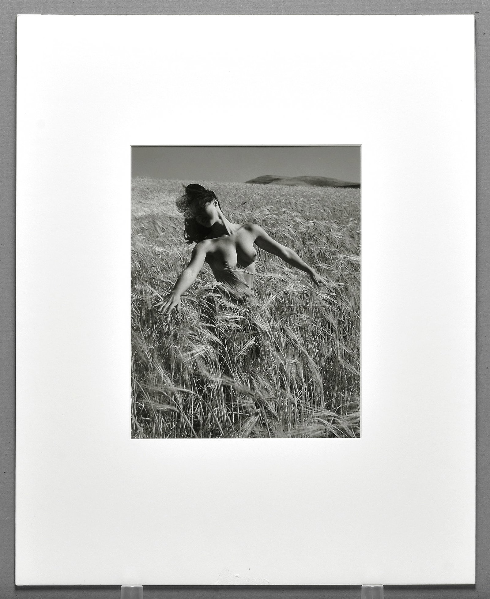 Andre De Dienes (1913-1985) Woman in the Fields, 1953 Photograph 10"x8": A striking vintage nude study by Andre De Dienes, blending the human form with the natural landscape in the lyrical style that helped define his finest work of the 1950s. Woman in the Fields (1953), a