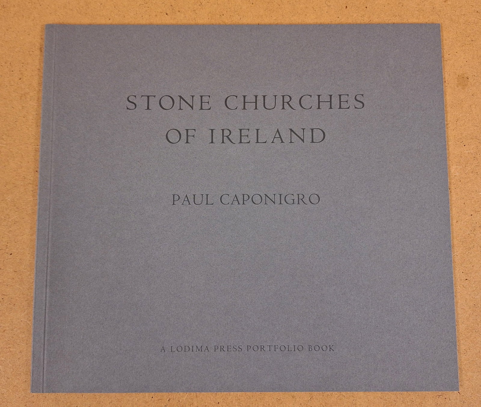 Paul Caponigro - Signed - Stone Churches of Ireland - 2007 Limited Edition - Softcover: Stone Churches of Ireland presents Paul Caponigro's deeply contemplative photographs of Ireland's ancient stone churches, oratories, monastic sites, and sacred landscapes. Caponigro first traveled to 