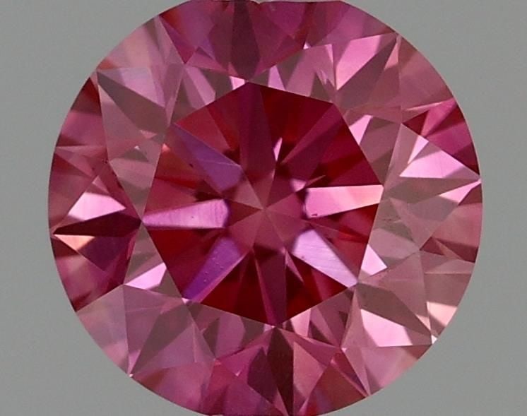 ROUND 0.55ct Fancy Vivid Pink VS1 - Unset Diamond: ROUND 0.55ct Fancy Vivid Pink VS1 - Unset Diamond Source: This is a real diamond grown in a lab not mined. Clarity: VS1 Polish: VG Cut: VG Symmetry: VG Measurements: 5.2 - 5.24 X 3.28 Certification: I