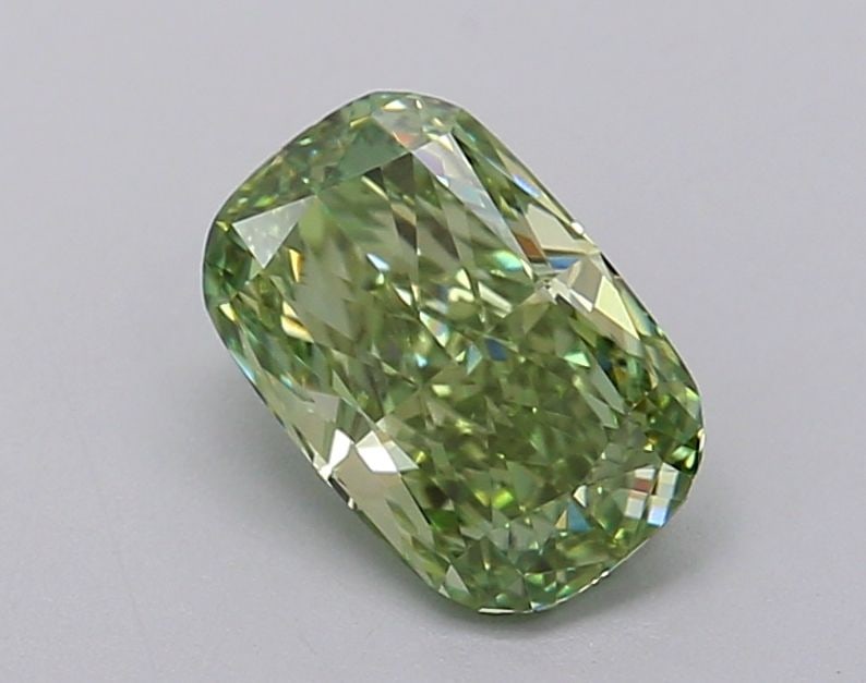 CUSHION BRILLIANT 0.94ct Fancy Vivid Green VS1 -: CUSHION BRILLIANT 0.94ct Fancy Vivid Green VS1 - Unset Diamond Source: This is a real diamond grown in a lab not mined. Clarity: VS1 Polish: EX Cut: - Symmetry: VG Measurements: 7.06 - 4.67 X 3.3 Cert