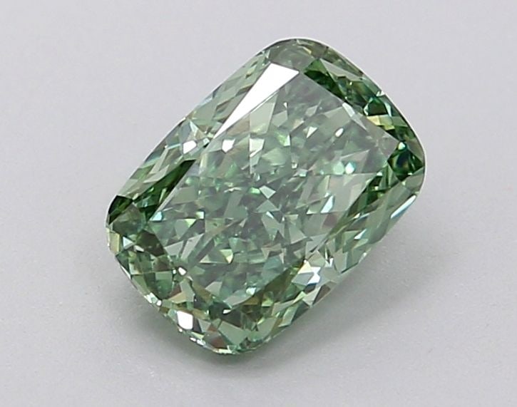 CUSHION BRILLIANT 0.89ct Fancy Vivid Green VS1 -: CUSHION BRILLIANT 0.89ct Fancy Vivid Green VS1 - Unset Diamond Source: This is a real diamond grown in a lab not mined. Clarity: VS1 Polish: VG Cut: - Symmetry: GD Measurements: 6.61 - 4.72 X 3.22 Cer