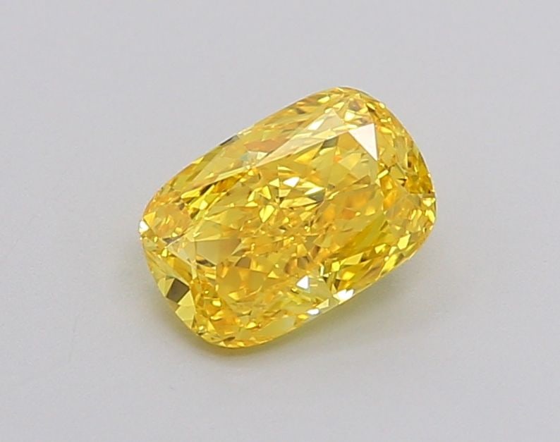 CUSHION BRILLIANT 0.66ct Fancy Vivid Yellow VS2 -: CUSHION BRILLIANT 0.66ct Fancy Vivid Yellow VS2 - Unset Diamond Source: This is a real diamond grown in a lab not mined. Clarity: VS2 Polish: VG Cut: - Symmetry: VG Measurements: 6.4 - 4.34 X 2.81 Cer