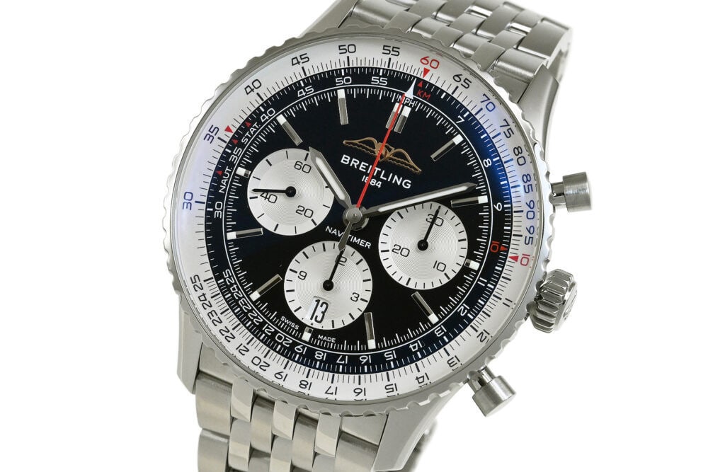 BREITLING Navitimer B01 Chronograph 43: Movement: Automatic Winding Case Size: 43mm Case Thickness: 13.5mm Dial Color: Black/Silver Case Material: SS Water Resistance: 3 ATM water resistant Watch Glass: Sapphire Crystal Type: Wrist watch At