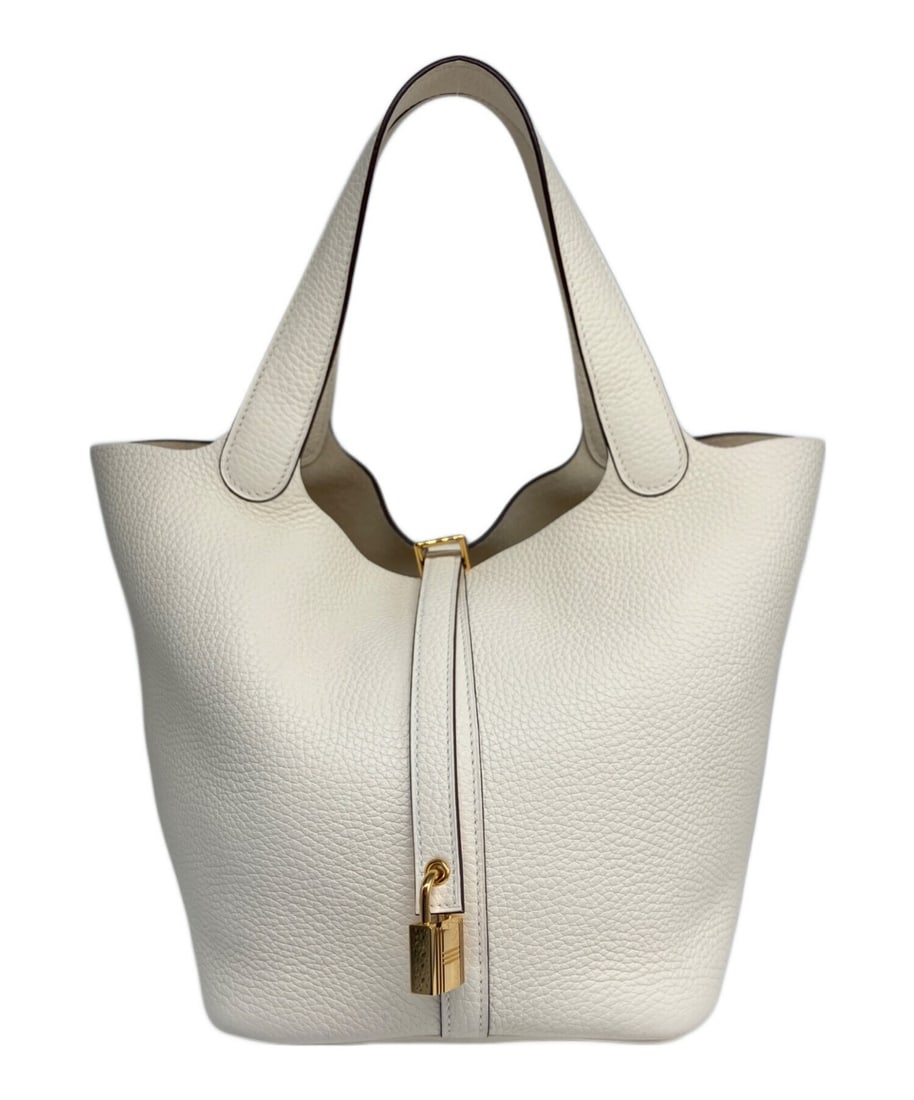 HERMES Picotin Lock MM SV Hardware Trillon: Exterior Material: Taurillon Clemence Exterior Color: Machete / Ivory Size: H:20.0cm / W:22.0cm / D:17.0cm Handle: 16.0cm Style: Handbag At SEUYCO, we strive to provide detailed and accurate descripti