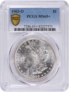1903-O Morgan Silver Dollar MS65+ PCGS: Certification: PCGS Circulated/Uncirculated: Uncirculated Year: 1903 Composition: 90% Silver 10% Copper Mint Location: New Orleans Km Number: 110 Denomination: $1 Grade: MS65 Coin: Morgan Designer: