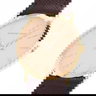 Audemars Piguet Extra Flat - Audemars Piguet: Movement: Hand-Wound Case Size: 31mm Case Material: K18 Yellow Gold Band Material: Aftermarket New Calf/K18 Yellow Gold Buckle Watch Glass: Glass Windshield Dial Color: Gold Type: Wrist watch At