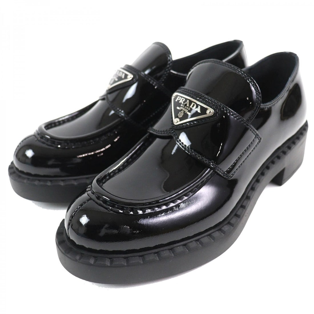 Prada Loafers 1D246M Patent Leather Black Chocolate 34.5: Material: Leather Gender: Women Brand: PRADA Item: loafers Model: chocolate Gender: Women Color: black Material: Main: Patent leather Accessories: Box, storage bag Notation Size: 34.5 Shoe Size Chart