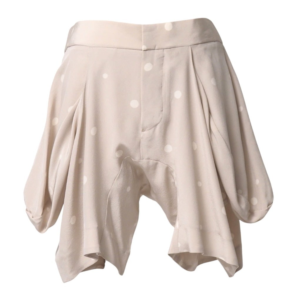 Marni Shorts Silk Beige Pamah41A00Ts962 38: Material: Silk Gender: Women Brand: MARNI Item: Shorts Model: PAMAH41A00TS962 Gender: Women Color: beige Material: silk Accessories: None Notation Size: 38 Size: cm (approx.): Waist: 78 Rise: 30 Insea