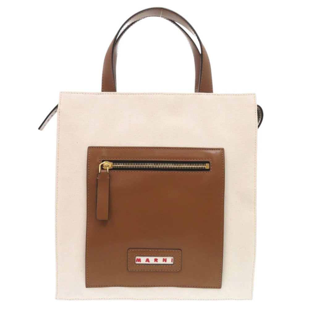 Marni Tote Bag Shmp008800 Canvas, Leather Two-Tone (Ivory) Women: Material: Leather Gender: Women Brand: MARNI Item: Tote Bag Gender: Women Color: Two-tone (Ivory) Material: Canvas, Leather Accessories: None Size: cm (approx.): W27 x H28.5 x D9 inch (approx.): W10.6