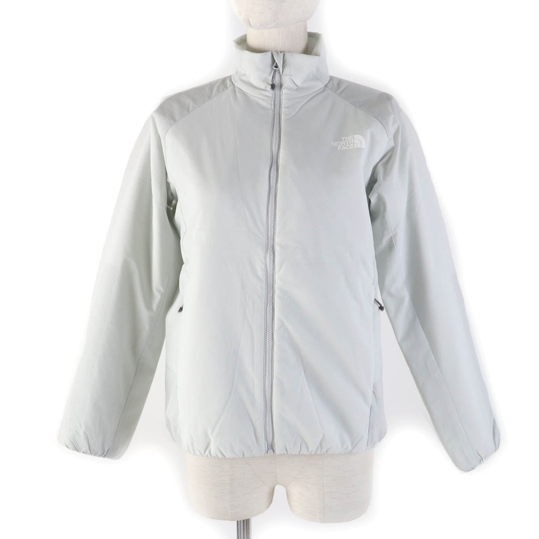 The North Face Jacket Vyw82206 Main: Material: Nylon Gender: Women Brand: THE NORTH FACE Item: Jacket Model: Nentrix Jacket Gender: Women Color: Light gray Material: Main: 100% nylon, Filling: 100% polyester, Lining: 100% nylon Accessori