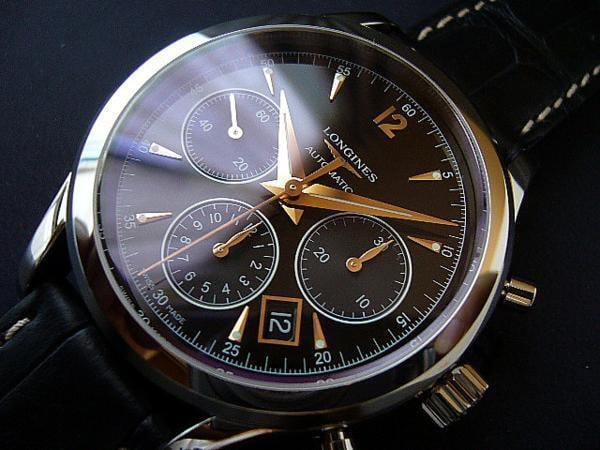 Longines Heritage Column Wheel Chronograph Watch Men: Brand: longines Type: Wristwatch Customized: Yes Style: watches Movement: Automatic Display: Analog Case Size: 39mm Product Disclaimer: Items may exhibit light wear, such as minor scratches or slight