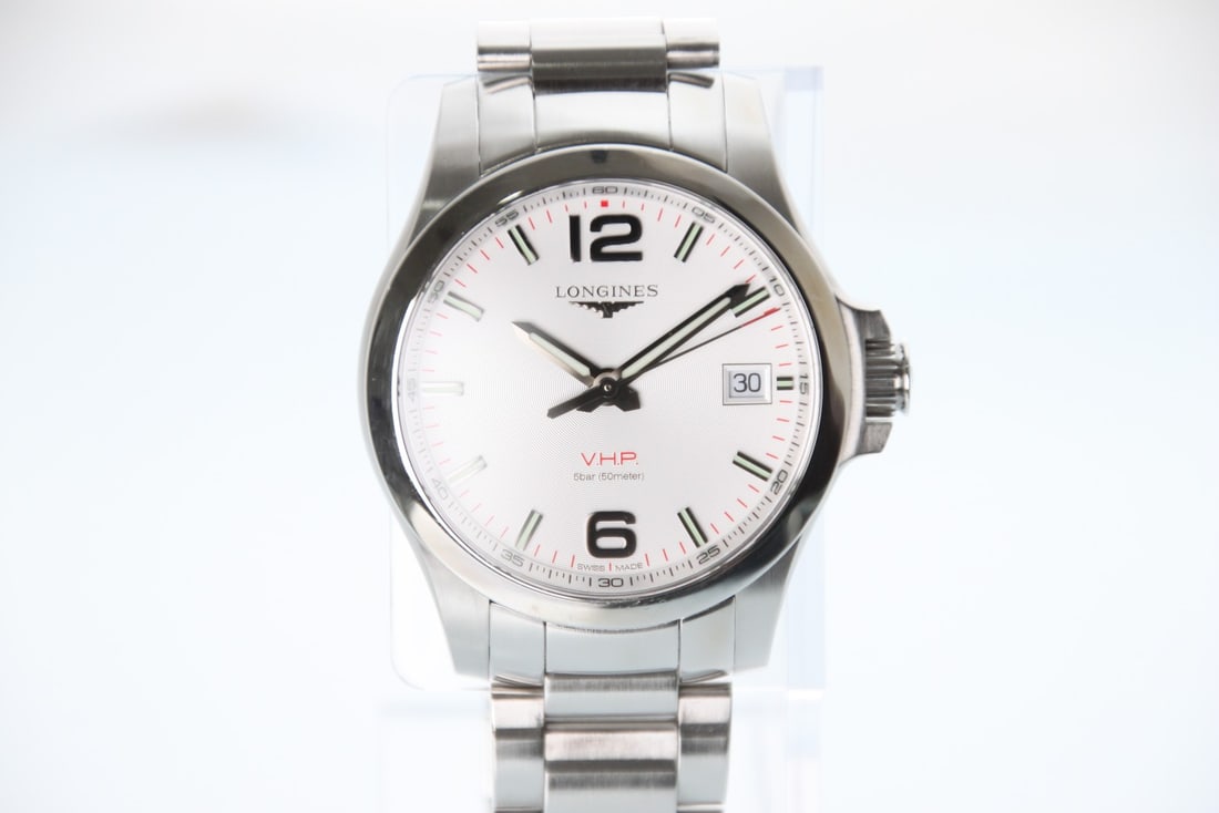 Longines Conquest L3.716.4: Brand: Longines Type: Wristwatch Customized: Yes Style: watches Features: Date Movement: quartz Dial Color: White Band Color: Silver Case Color: Silver Display: Analog Case Material: SS With Original