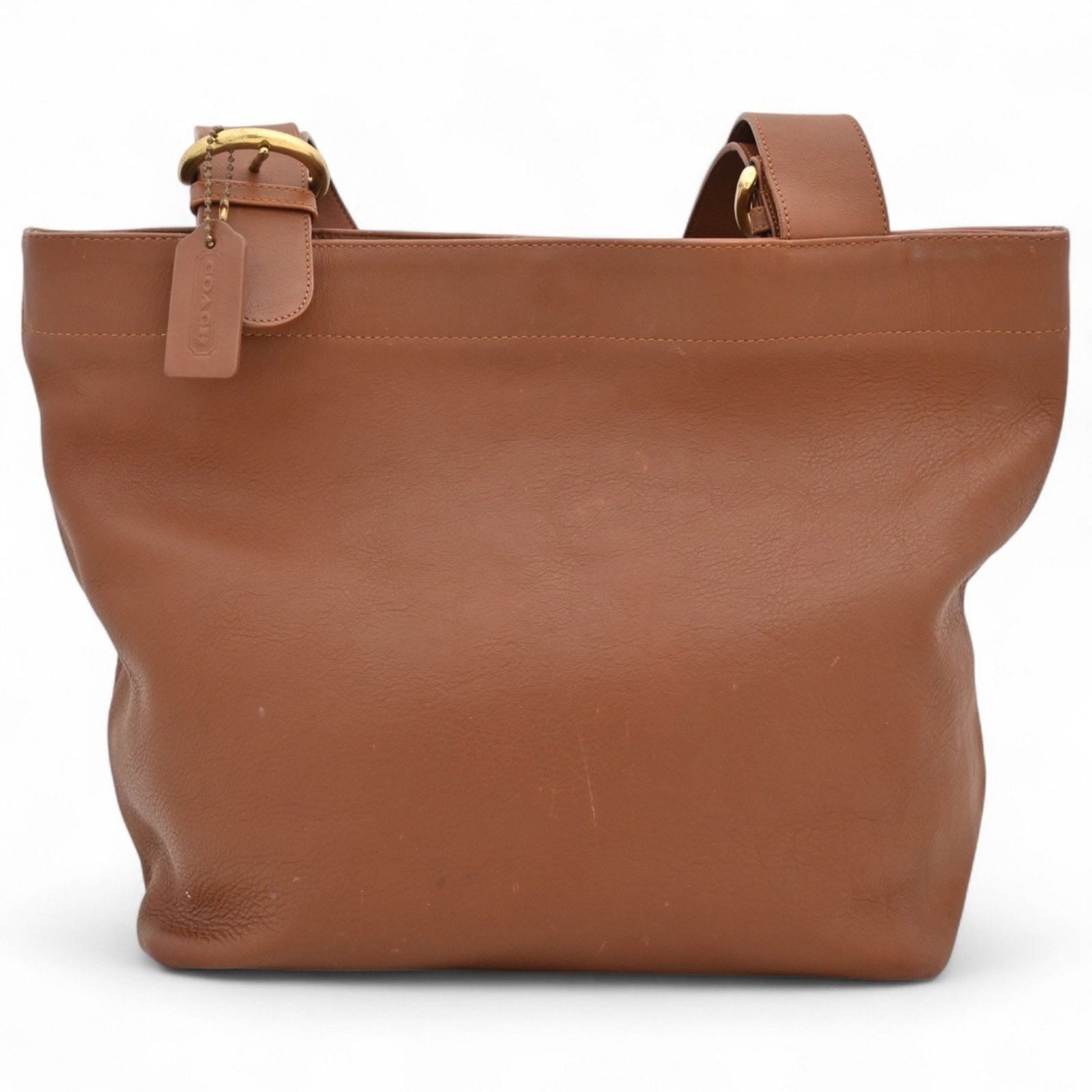 Coach Tote Bag In Brown Leather: Brand: Coach Type: Handbag, Tote Bag Material: Leather Color: Brown Gender: Women Size (Hxwxd): 29cm x 29cm x 13cm / 11.41'' x 11.41'' x 5.11'' Condition: Used (good), Traces of usage, scratches / dir